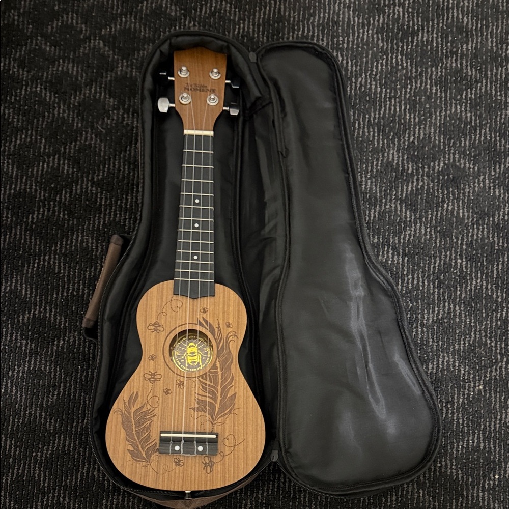 Wooden Ukulele with Feather Design